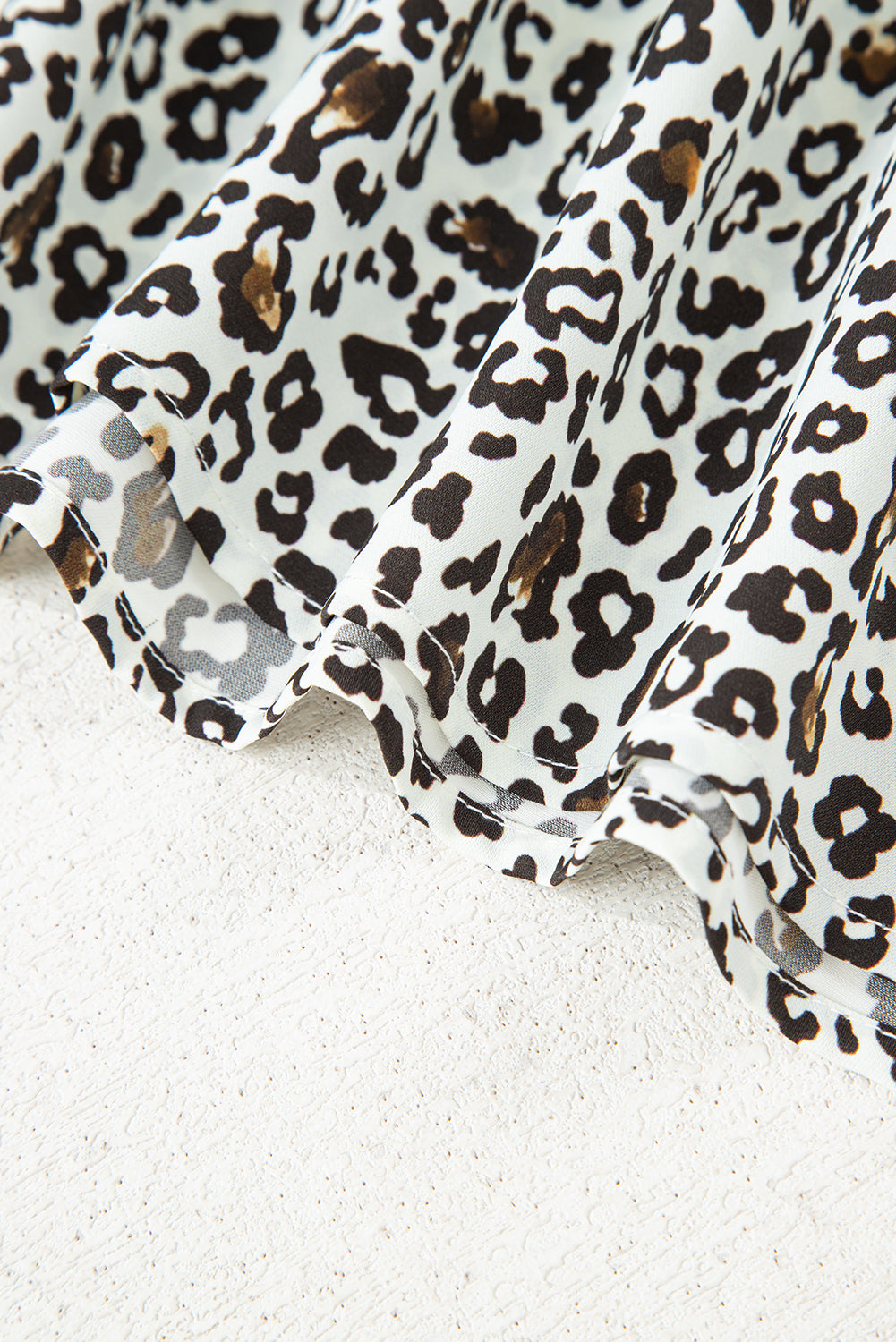 Plus size mini-jurk met knoopsluiting V-hals luipaard of bloemenprint losse pasvorm