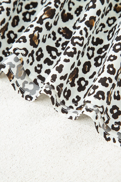 Plus size mini-jurk met knoopsluiting V-hals luipaard of bloemenprint losse pasvorm