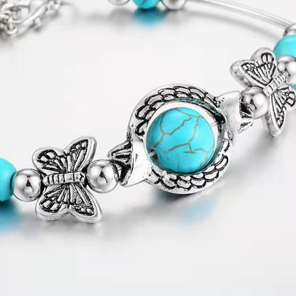 Retro turquoise vlinderarmband