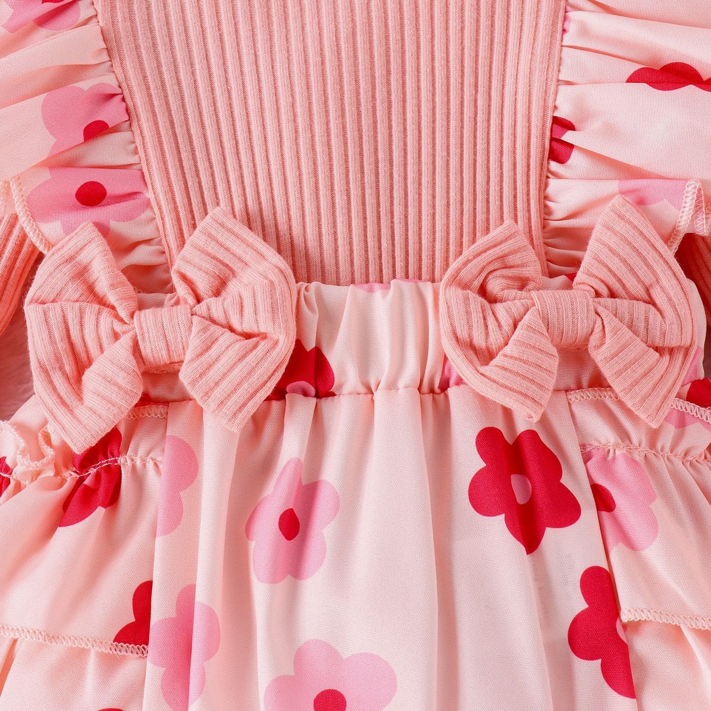 Eendelige romperbroek met strikhoofdtooi