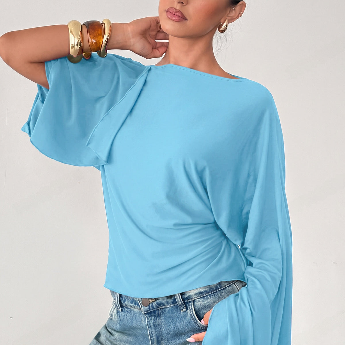 Casual gebreide slim fit top met lange wijde mouwen en strik op de rug