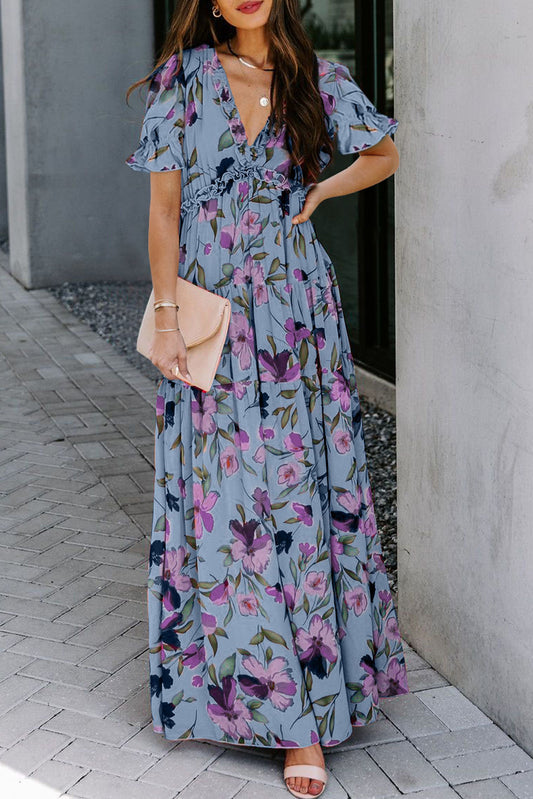 Hemelsblauwe maxi-jurk met vurige bloemenprint ruches V-hals en korte mouwen