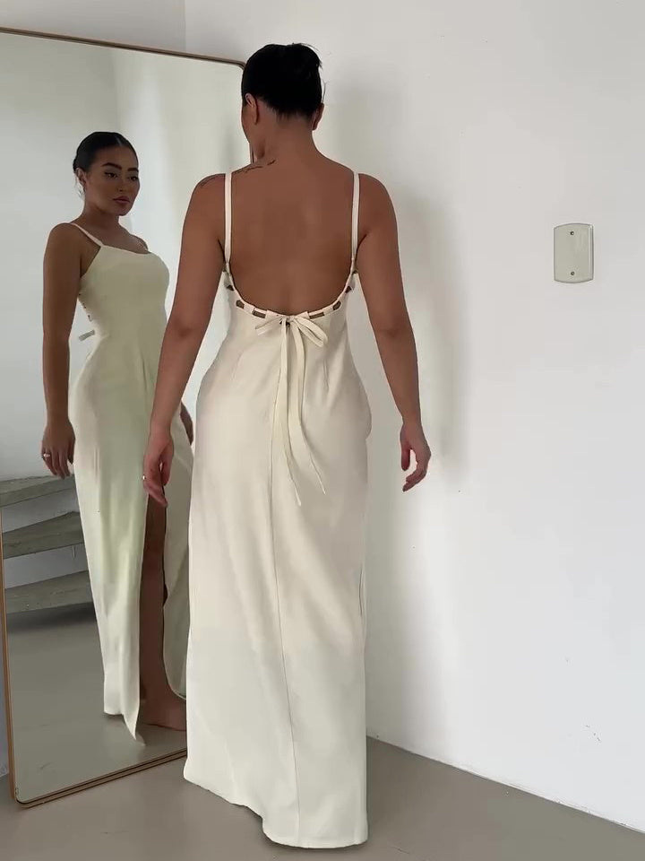 Jurk met bandjes en split van katoen en linnen