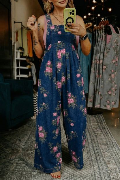 Jumpsuit van denim met bloemenprint zakken geplooide details hoge taille en wijde pijpen