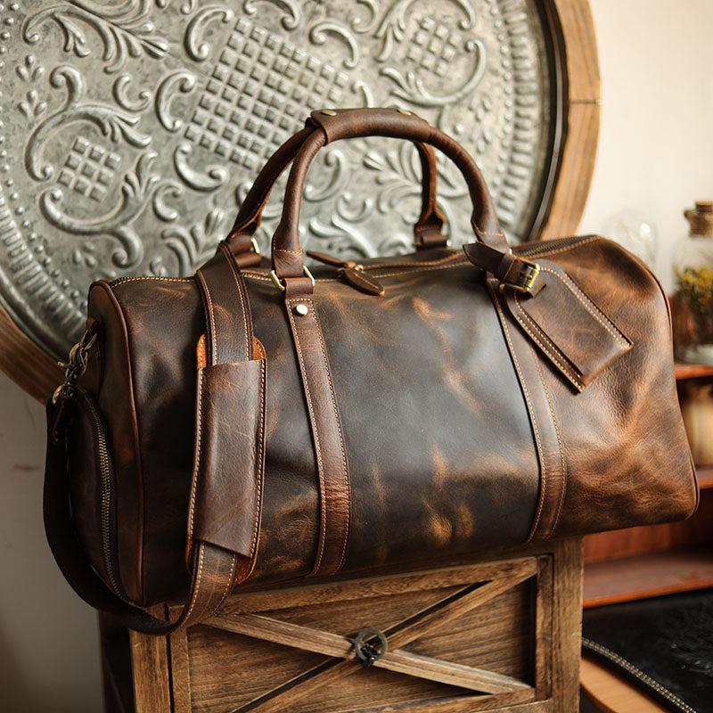 A men's hand-held outdoor camping travel bag made of cowhide