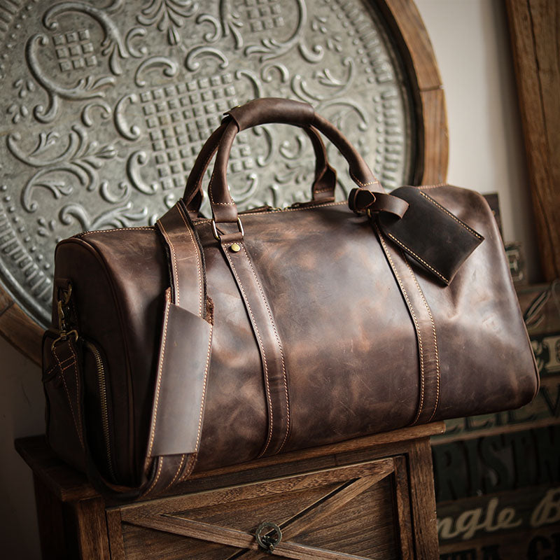 A men's hand-held outdoor camping travel bag made of cowhide