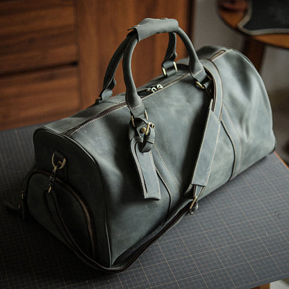 A men's hand-held outdoor camping travel bag made of cowhide