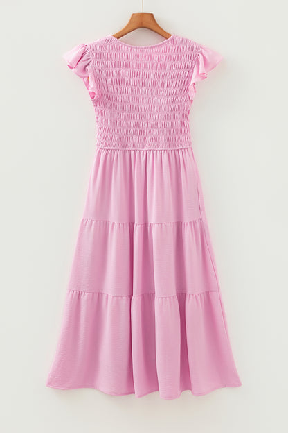 Roze midi-jurk met geplooide top wijd uitlopende mouwen en ruches