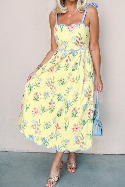 Roze midi-jurk met bloemenprint contrasterende bies strikbandjes en hoge taille