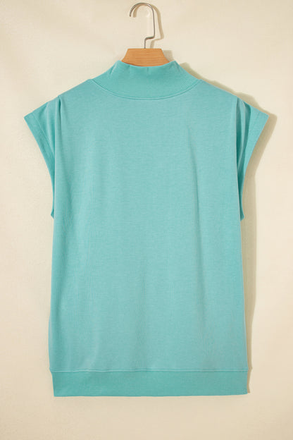 Effen top met hoge hals en korte mouwen osvallend model