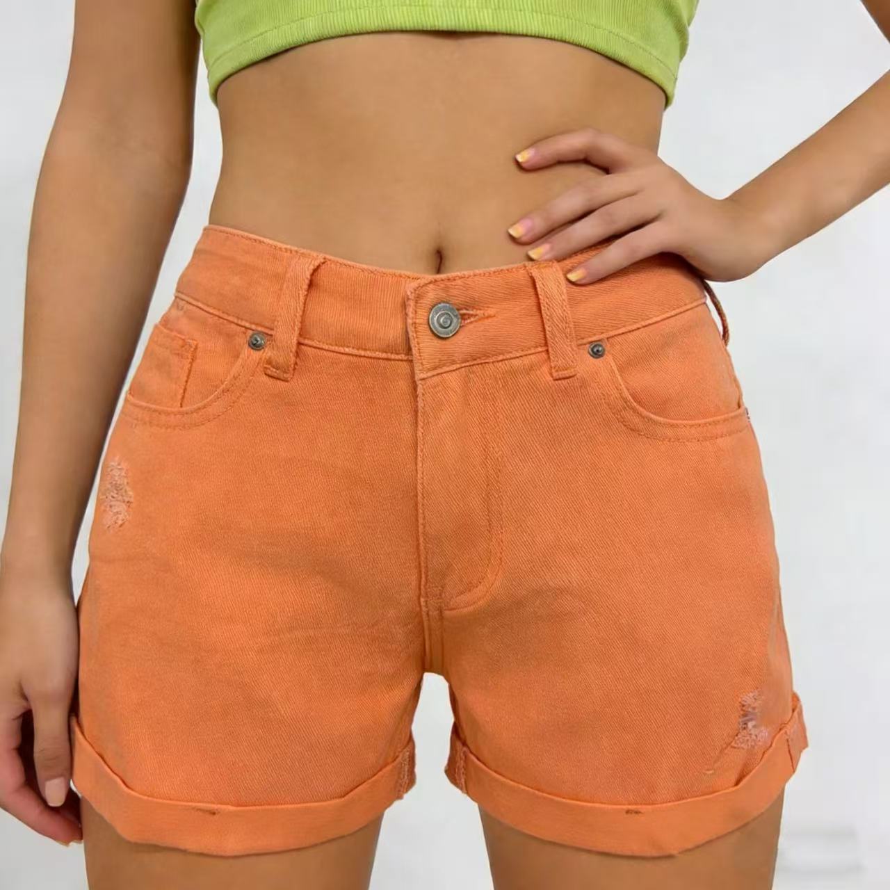 Women's Denim Shorts with Ripped Details and Tassels