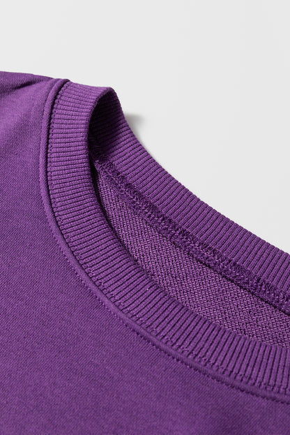 Preppy sweatshirt met strepen op de mouwen en een losse pasvorm