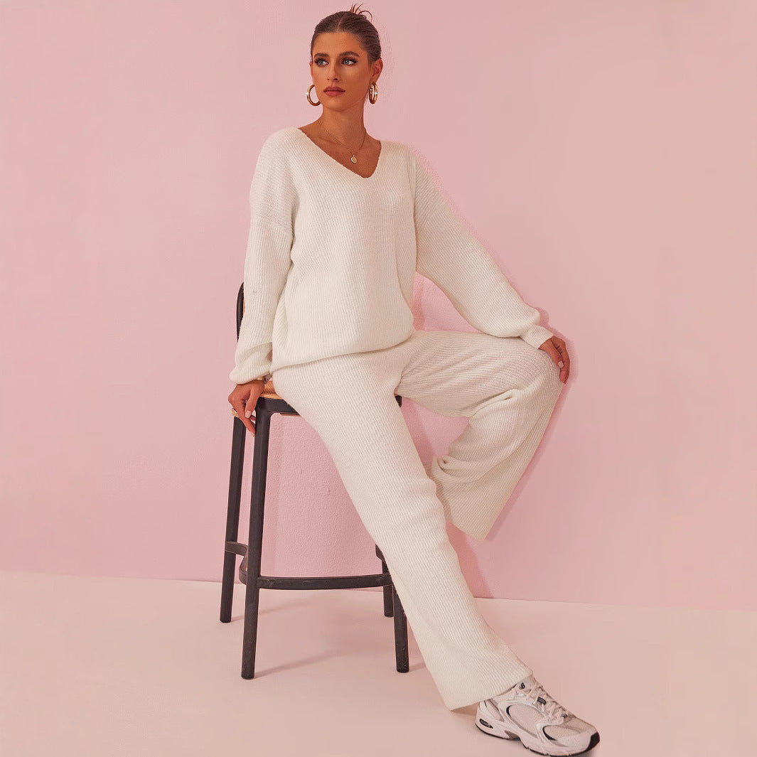 Gebreid geborsteld pak met lange mouwen en verzonken strepen