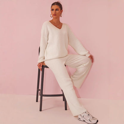 Gebreid geborsteld pak met lange mouwen en verzonken strepen