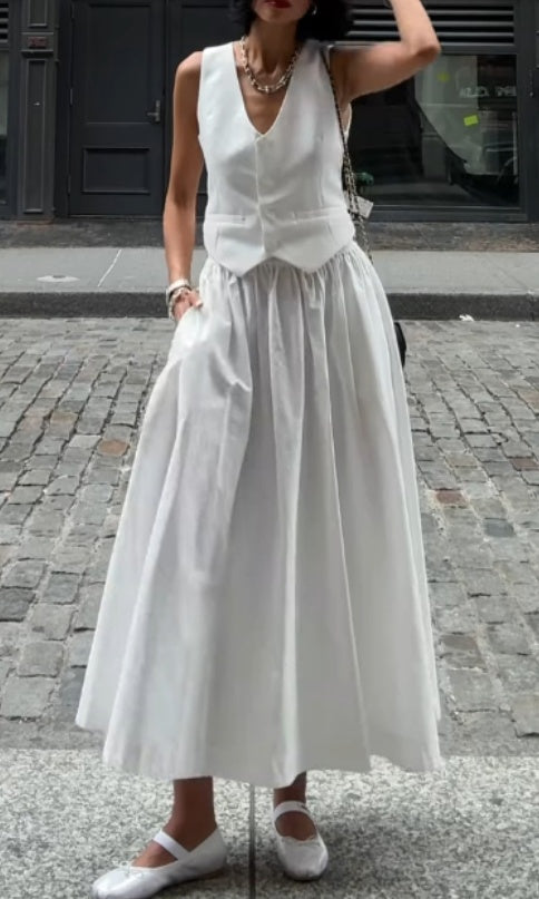 Set van effen vest en swingrok