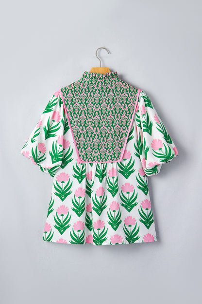Blouse met veelkleurige bloemenprint pofmouwen contrasterende boord en V-hals
