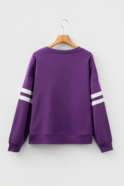 Preppy sweatshirt met strepen op de mouwen en een losse pasvorm