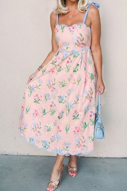 Roze midi-jurk met bloemenprint contrasterende bies strikbandjes en hoge taille