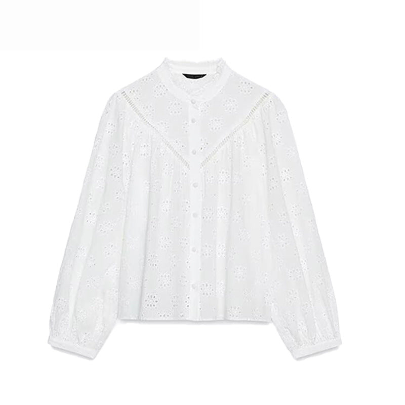 Damesblouse met opengewerkte borduursels