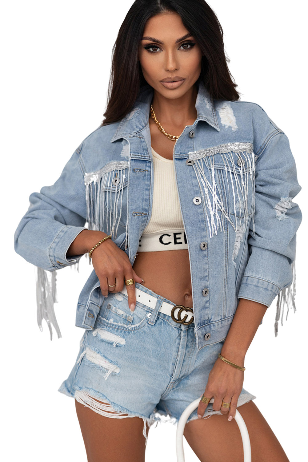 Hemelsblauwe denimjas met pailletten en franjes in een verweerde look