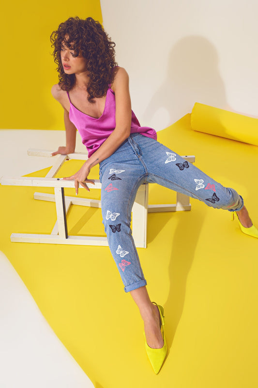 Skinny jeans met vlinderdetails in lichtblauwe wassing