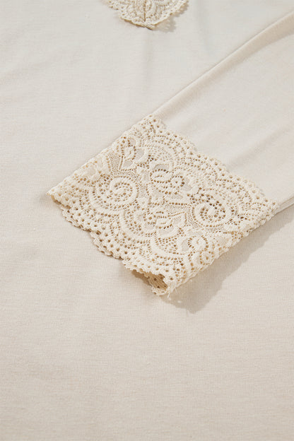 Abrikooskleurige kanten V-hals trui met lange mouwen en patchwork-effect