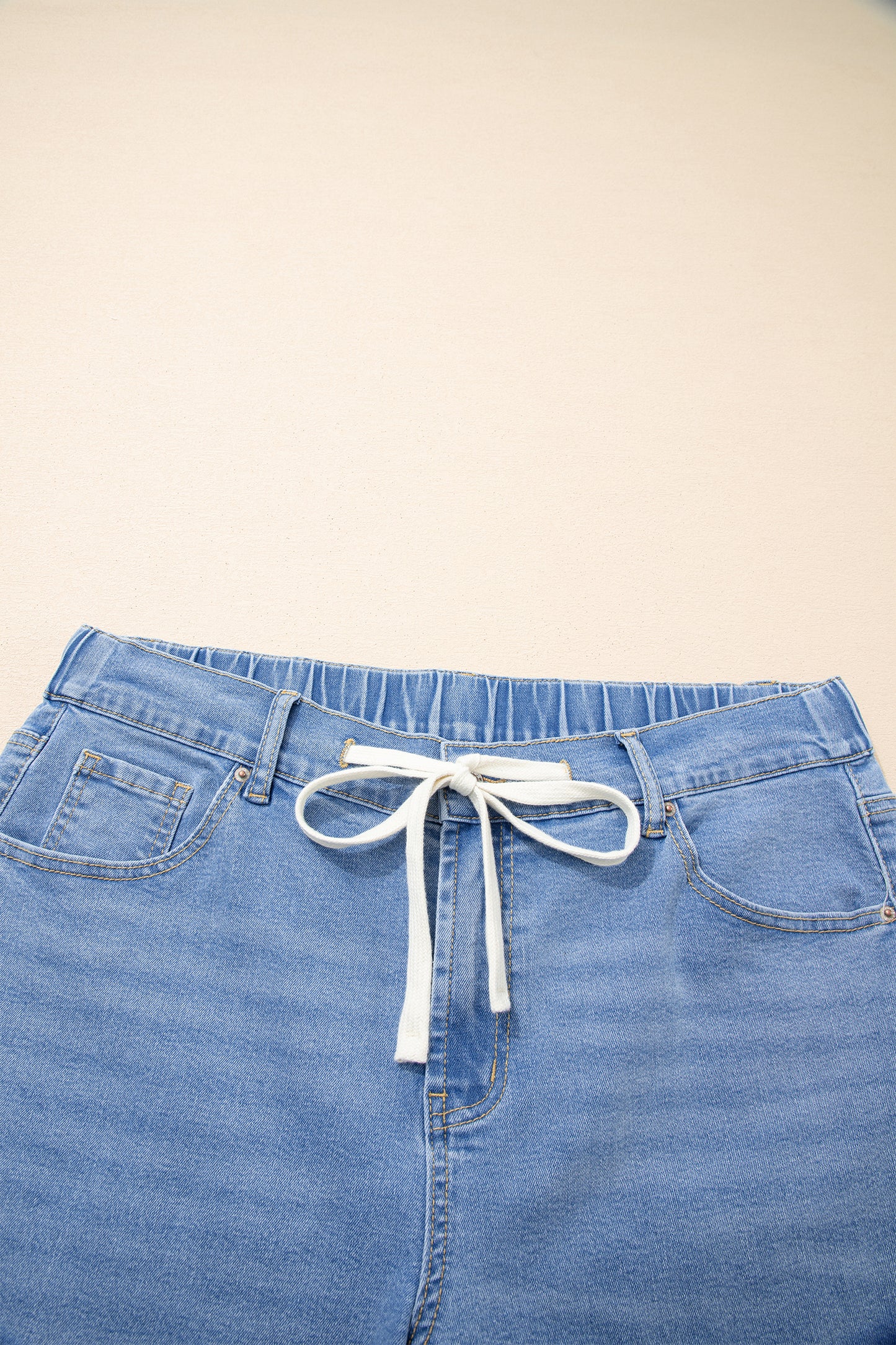 Jeans met acid wash-effect en vetersluiting plus size