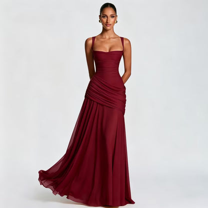 Elegante mouwloze jurk met plooien en wijde rok