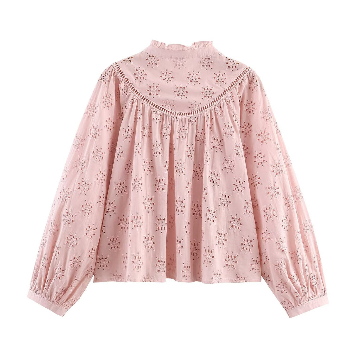 Damesblouse met opengewerkte borduursels