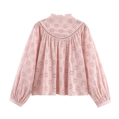 Damesblouse met opengewerkte borduursels
