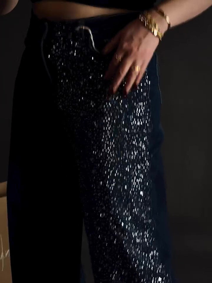 Enkelzijdige jeans met strass en wijde pijpen