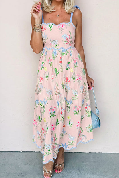 Roze midi-jurk met bloemenprint contrasterende bies strikbandjes en hoge taille