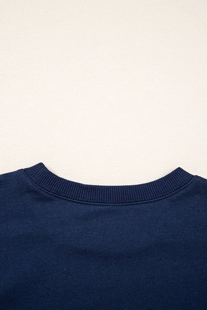 Preppy sweatshirt met strepen op de mouwen en een losse pasvorm