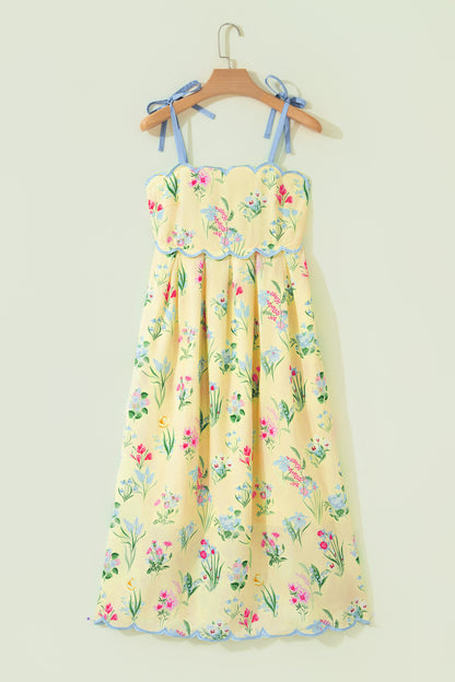 Roze midi-jurk met bloemenprint contrasterende bies strikbandjes en hoge taille