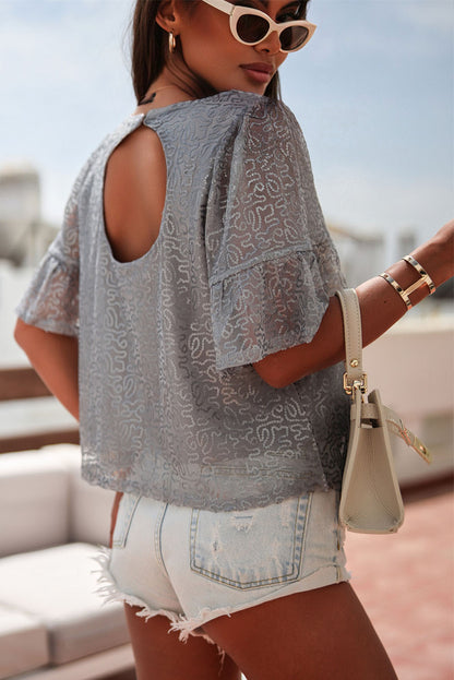 Grijze mesh blouse met ruchesmouwen en pailletten