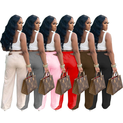 Effen kleur cut out taille wijde uitlopende broek