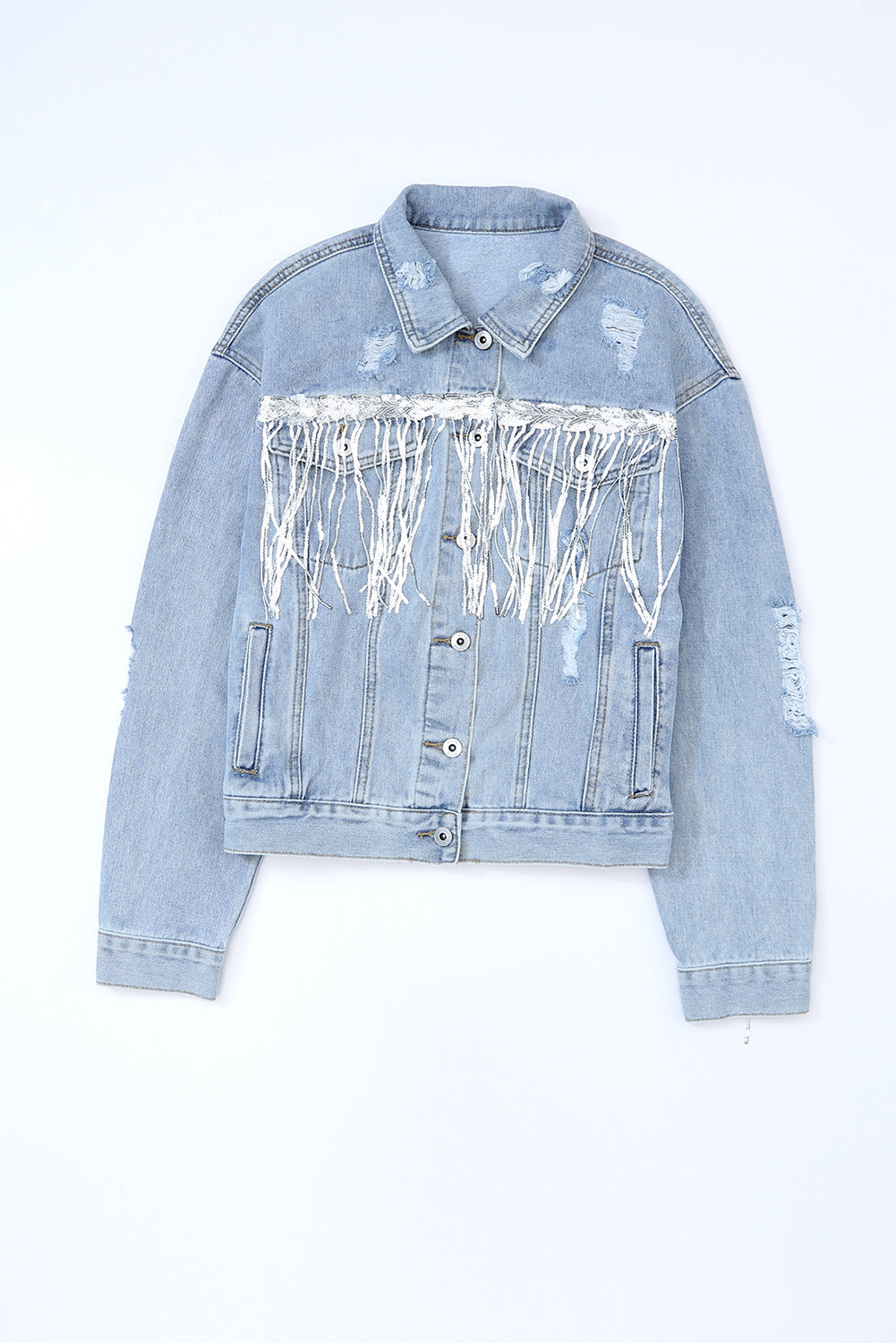 Hemelsblauwe denimjas met pailletten en franjes in een verweerde look