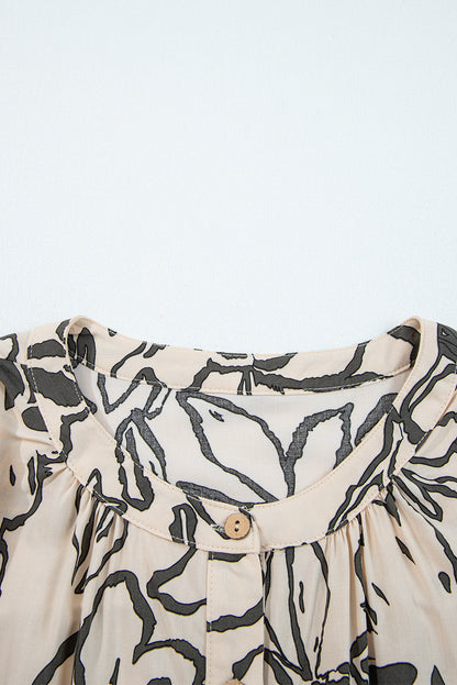 Losse blouse met bloemenprint vleermuismouwen en knoopsluiting