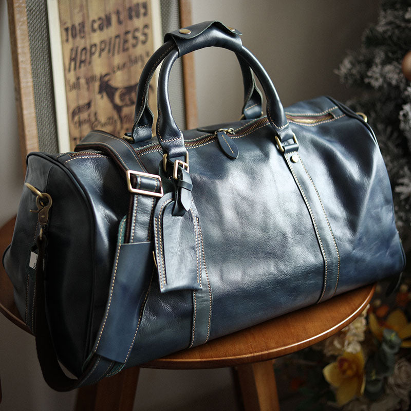 A men's hand-held outdoor camping travel bag made of cowhide