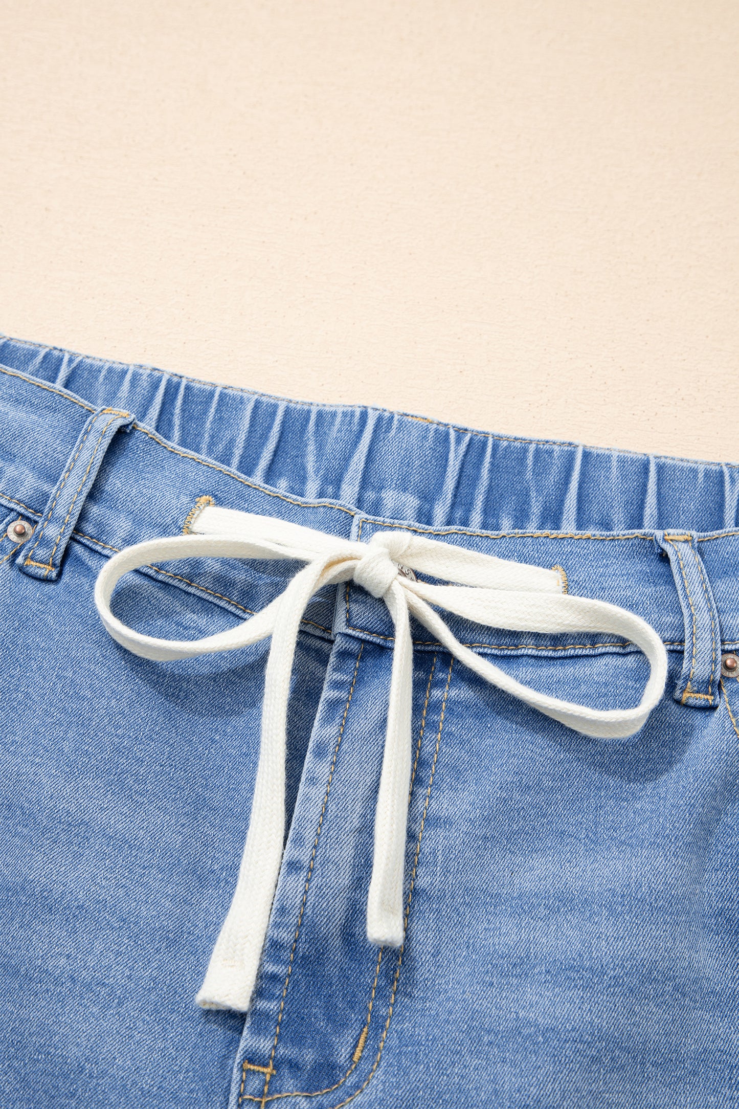 Jeans met acid wash-effect en vetersluiting plus size