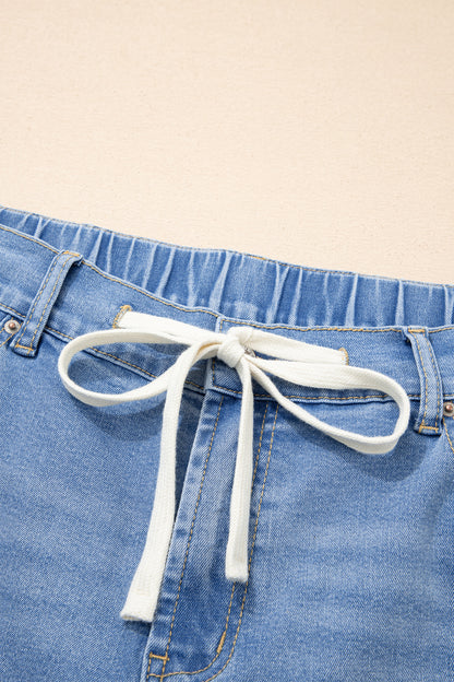 Jeans met acid wash-effect en vetersluiting plus size