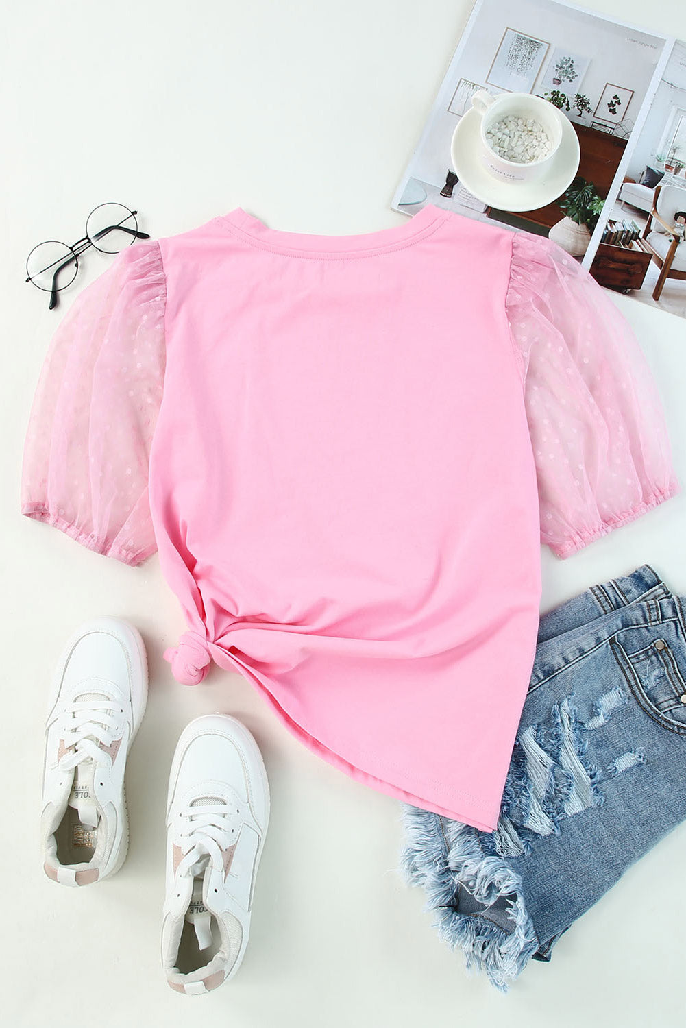 Roze top van tule met pofmouwen