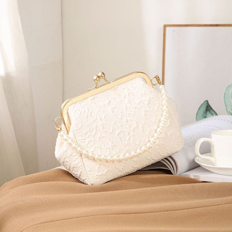 Mini shell-shaped jewelry charm handbag made
