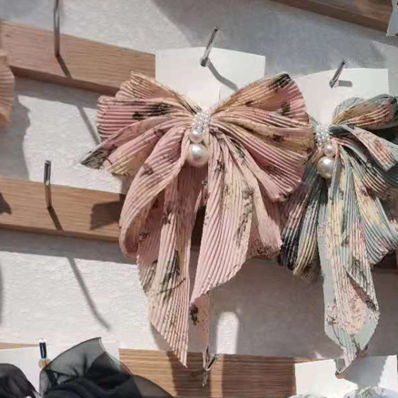 Grote strik bloemen haarspeld