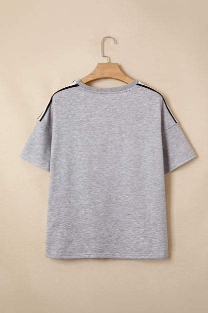 Lichtgrijze oversized T-shirt met patchworkdetails en onafgewerkte randen