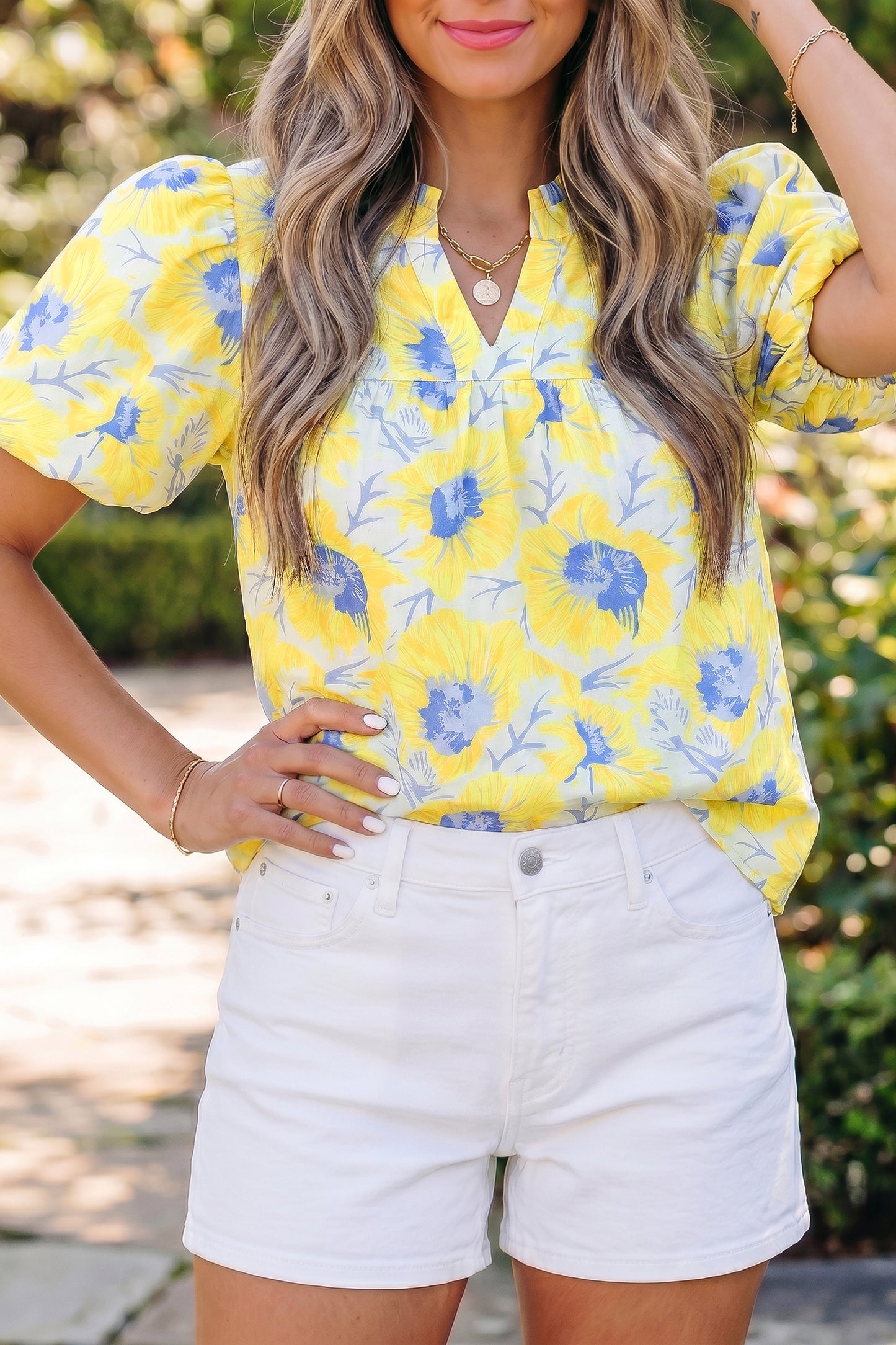 Zomerblouse met korte pofmouwen en bloemenprint
