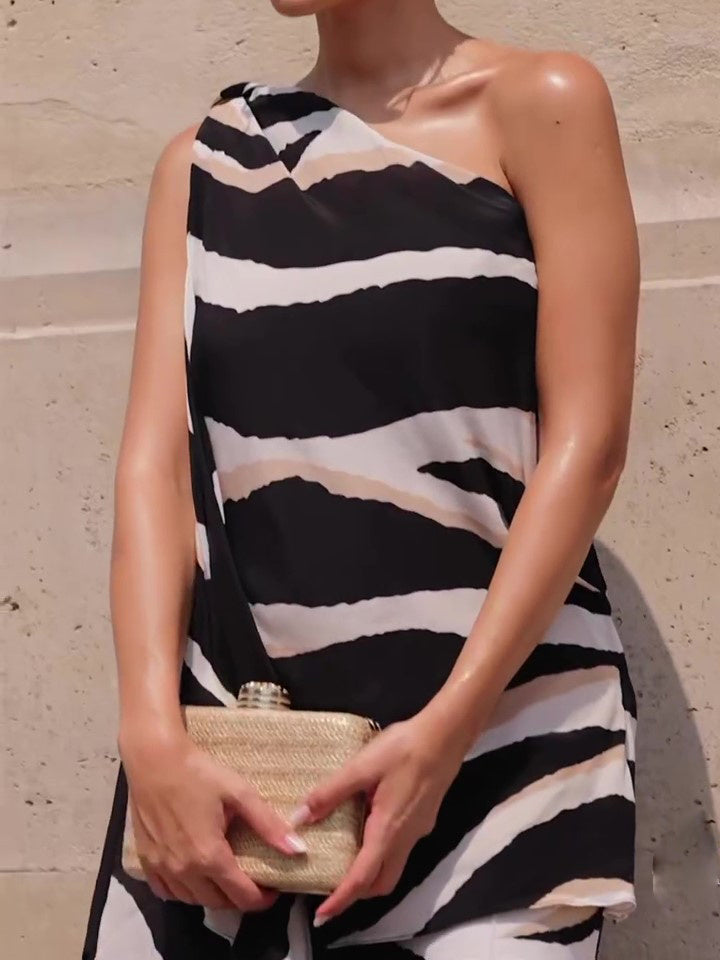 Zebraprint top met één schouder onregelmatige zoom wijde pijpen pak