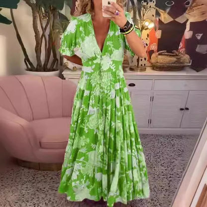 Lange jurk met bloemenprint en V-hals en elastische taille