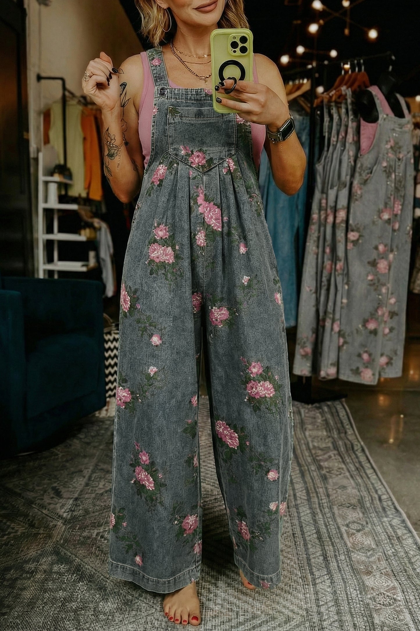 Jumpsuit van denim met bloemenprint zakken geplooide details hoge taille en wijde pijpen