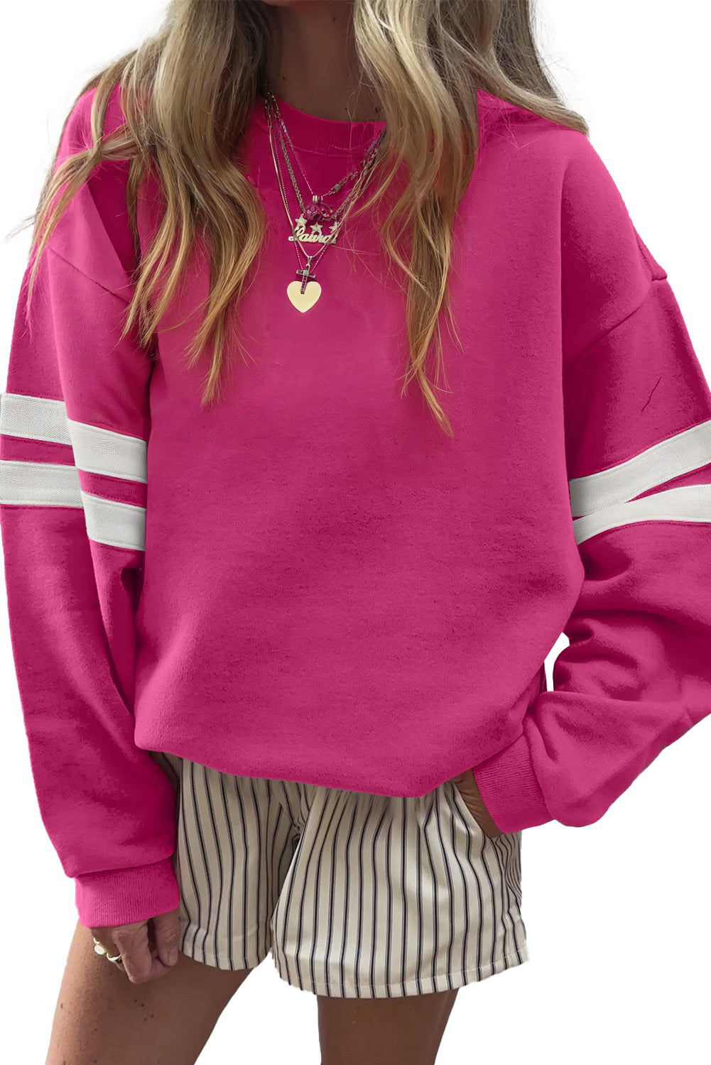 Preppy sweatshirt met strepen op de mouwen en een losse pasvorm